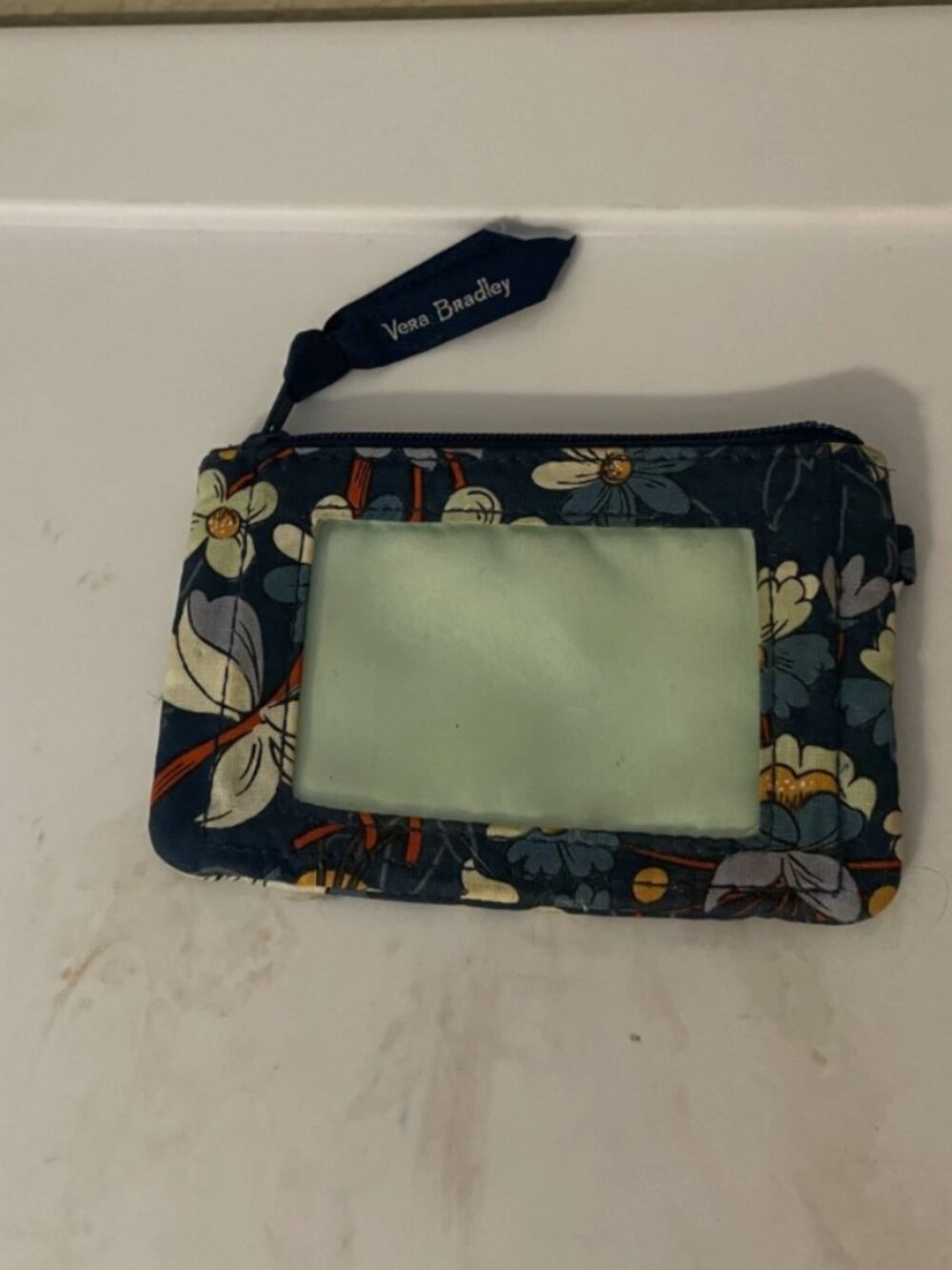 Vera Bradely badge holder floral patter blue with clip to attach to other items